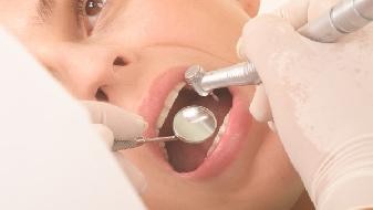 How much does it cost to have a dental replacement in the hospital?