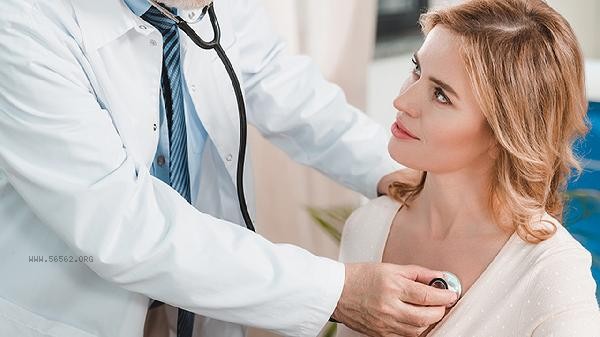 Can I drink water if I hold my urine during the physical examination