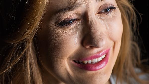 What is the reason for frequently feeling down but unable to cry