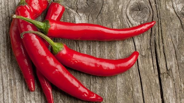 What is the most effective way to deal with spicy chili peppers