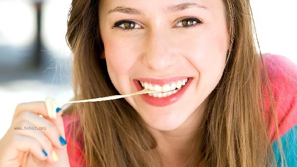 Can I take gum to freshen my breath before the physical examination?