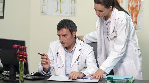 Will a small amount of alcohol consumption affect bilirubin levels during a physical examination?